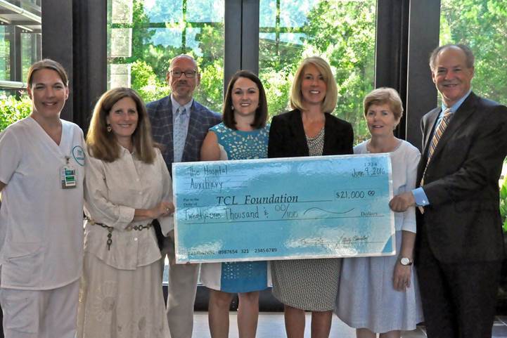 Pictured from left are Tracy Biel, TCL nursing student; Susan Silver, auxiliary president; Dr. Glenn Levicki, TCL Health Sciences Division dean; DeAnne Johnson, TCL Nursing Program interim director; Jessica Bridges, TCL assistant vice president for Institutional Advancement; Marty Eidemiller, Auxiliary Scholarship chairman; and Lew Wessel, chairman of the Annual Auxiliary Golf Tournament.