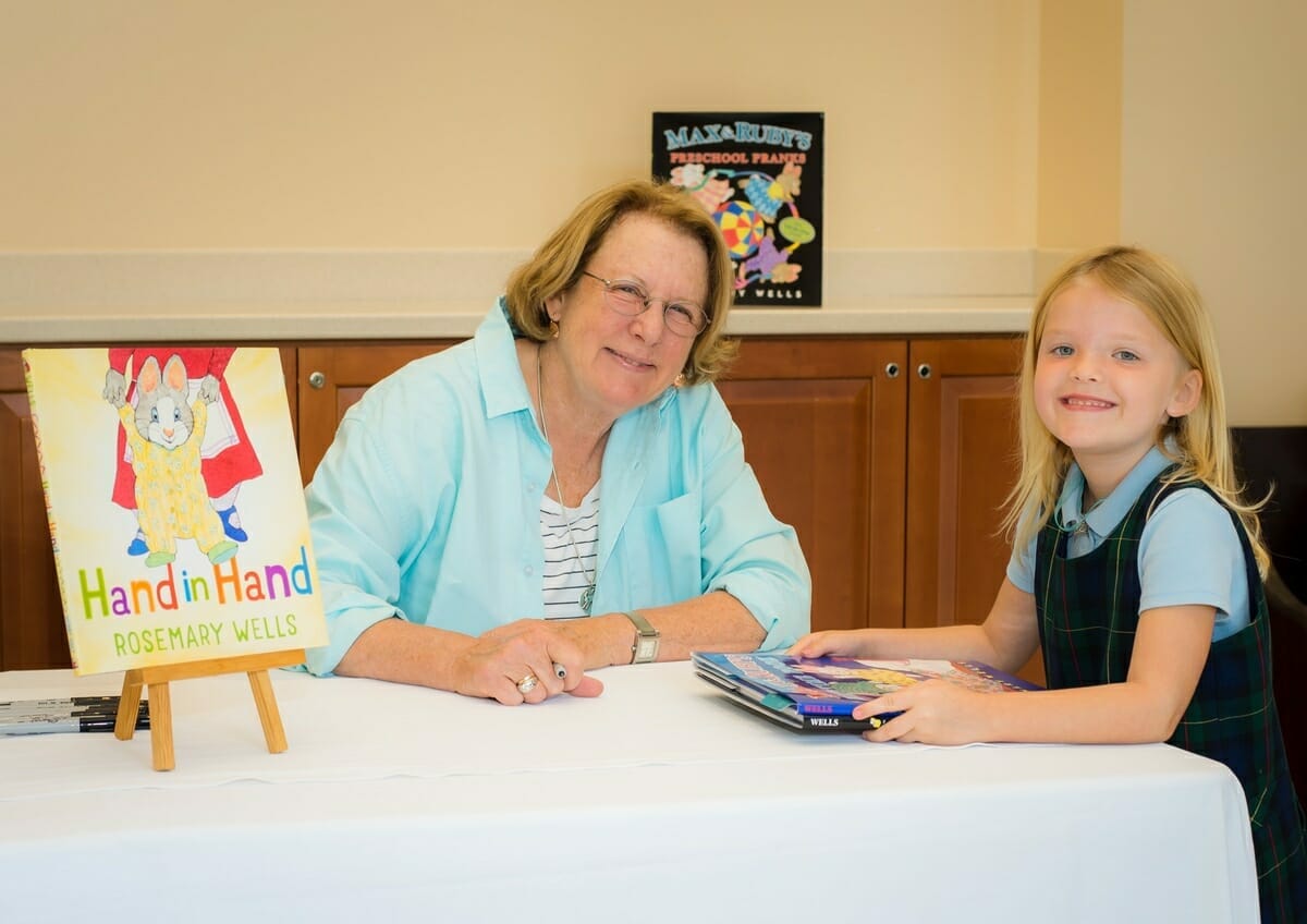 Rosemary Wells, author and illustrator of the popular children’s series “Max & Ruby,” selected Cross Schools as the first stop in a tour to promote her latest book, “Hand in Hand.” The event featured a meet-and-greet and book signing, as well as a Young Artists Workshop for grades K-4, and a Young Writers Workshop for grades 5-8. Cross Schools is an independent Christian school in Bluffton serving children from 18 months through eighth grade. Wells is shown here with kindergartener Zoe Vermilyea, daughter of Kate and Jody Vermilyea.