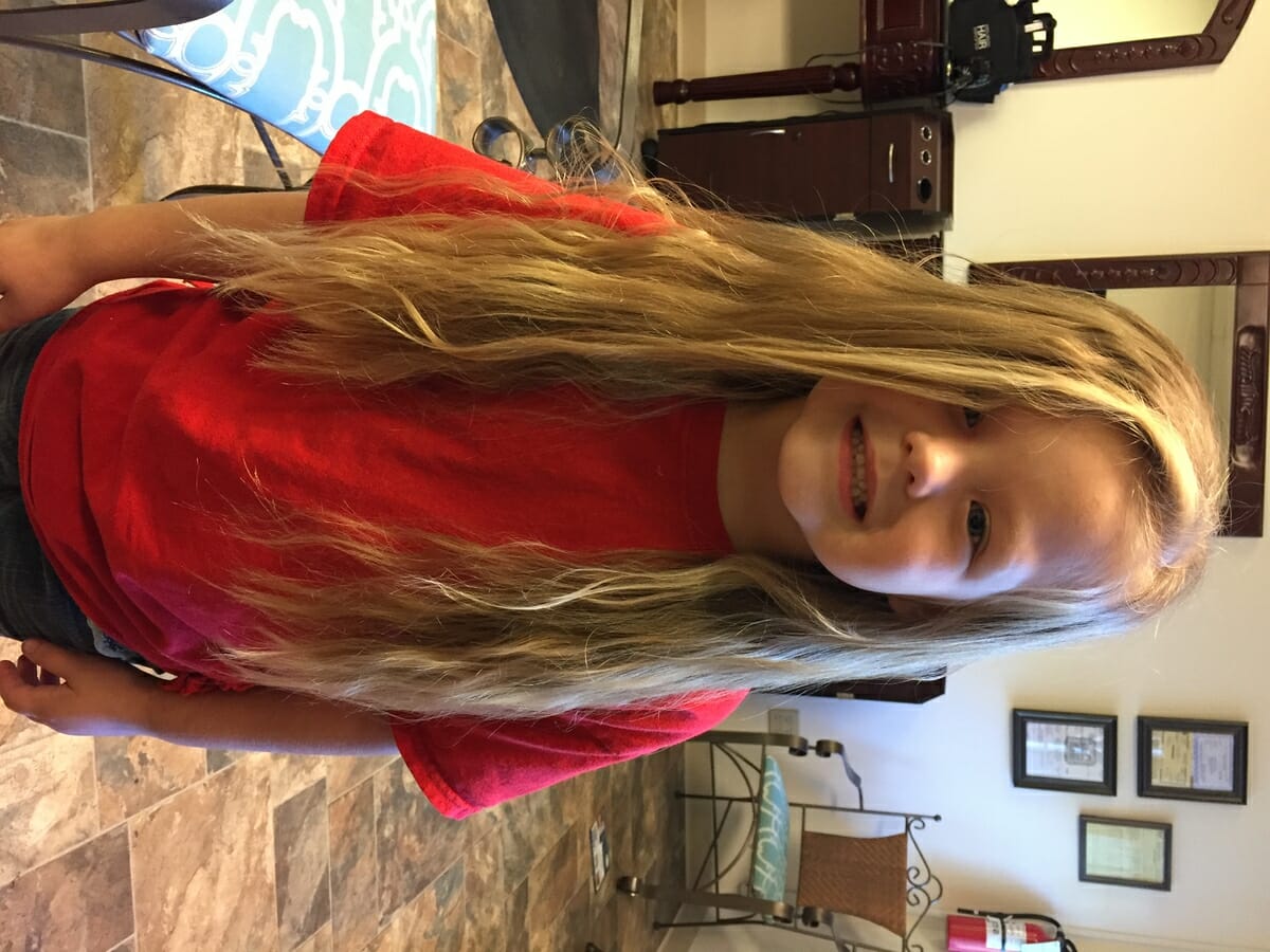 Rhyleigh Conley had never had her hair cut before getting it chopped for the first time. The stylist at Shear Sensations is Tia Campanella.