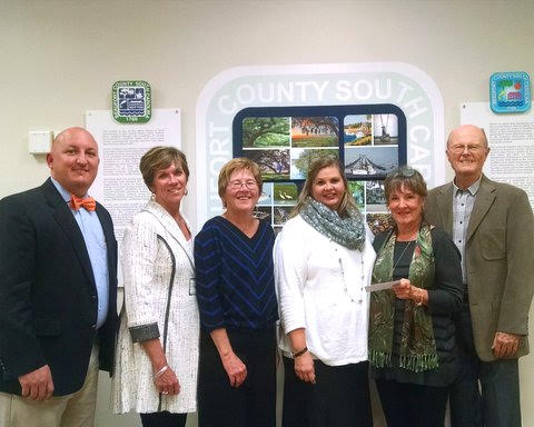 From left are Greg Hall, LIMS principal; VAC members Marj Shymske and Kathy McShane; LIMS art teacher Cadra Rooney; and VAC members Laura Bricker and Bill Tremitiere.