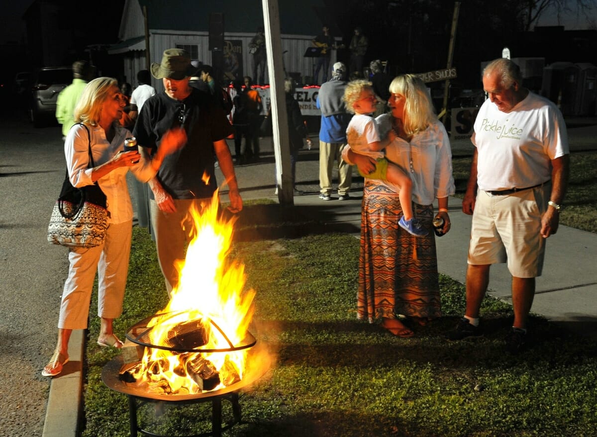Patrols at the annual Bands, Brews & BBQ warm themselves by one of several fires in Port Royal. 