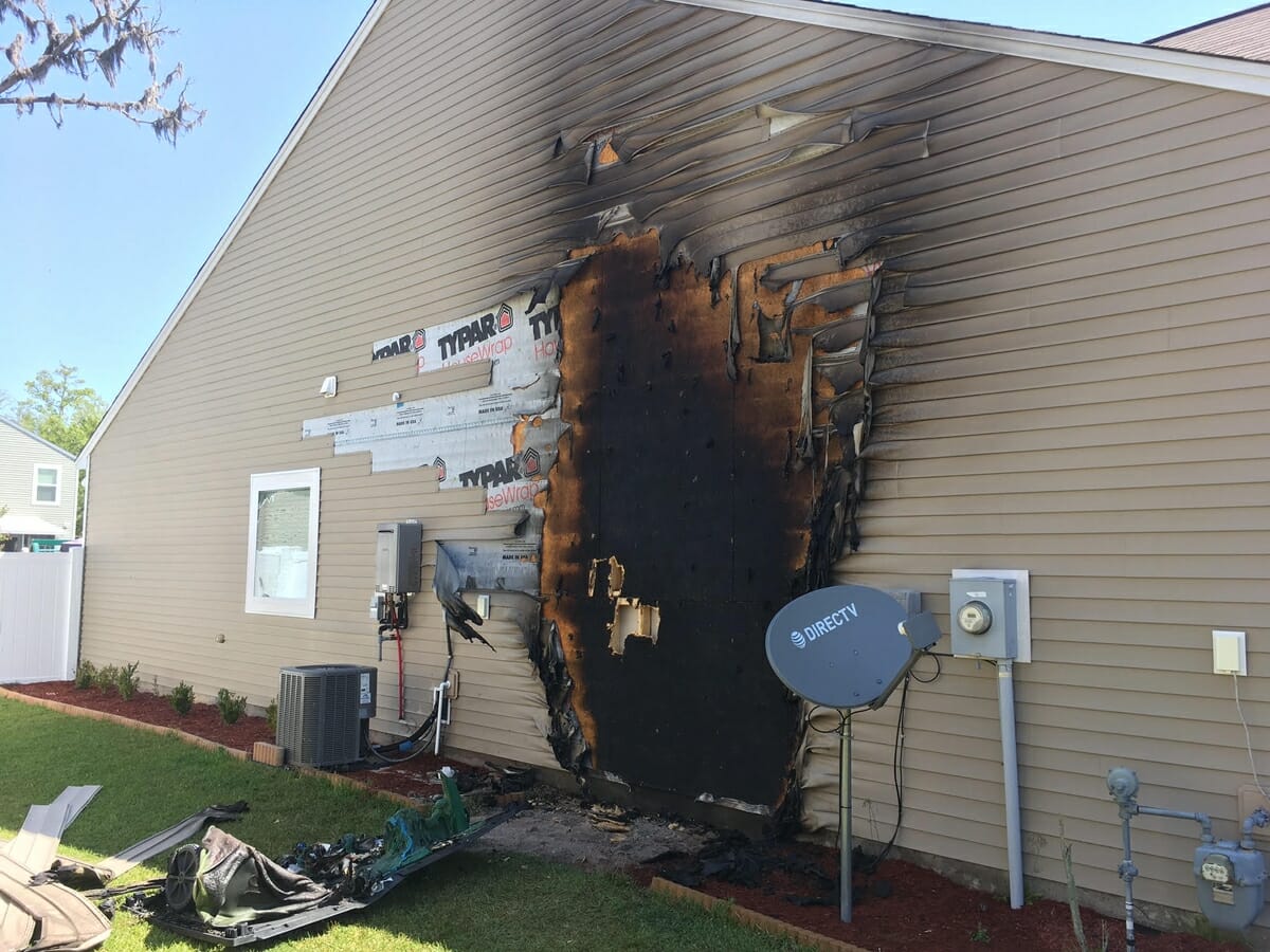 A fire that began in a waste container up against a home spread to the side of the residence in Shadow Moss. 