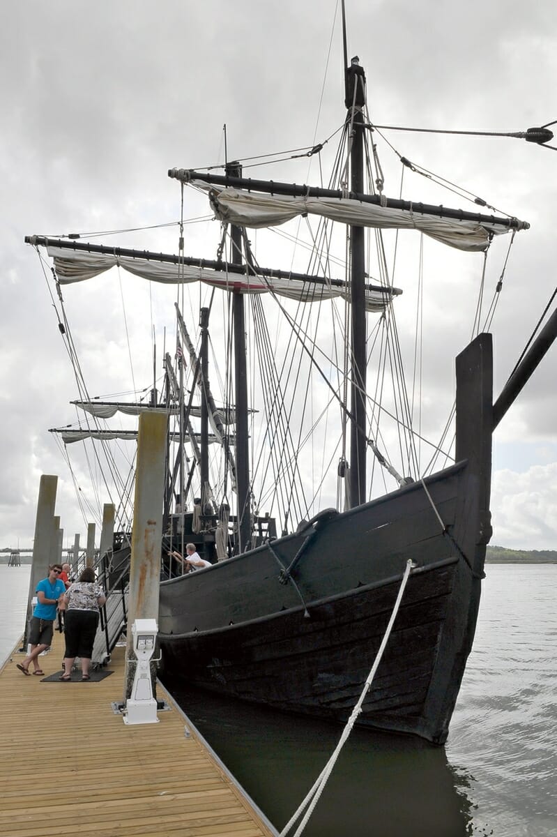 Replica ships of Columbus’ Pinta, foreground, and Nina visited Beaufort last week at the Downtown Marina. Here, members of press meet some of the crew on April 19.
