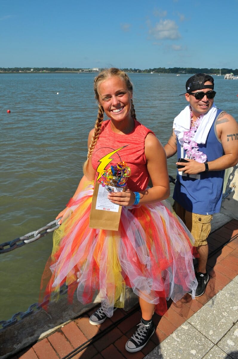 Boat drummers, like Kinsey Olson for “Thunder Struck,” also went around and gathered donations from spectators at Henry C. Chambers Waterfront Park.