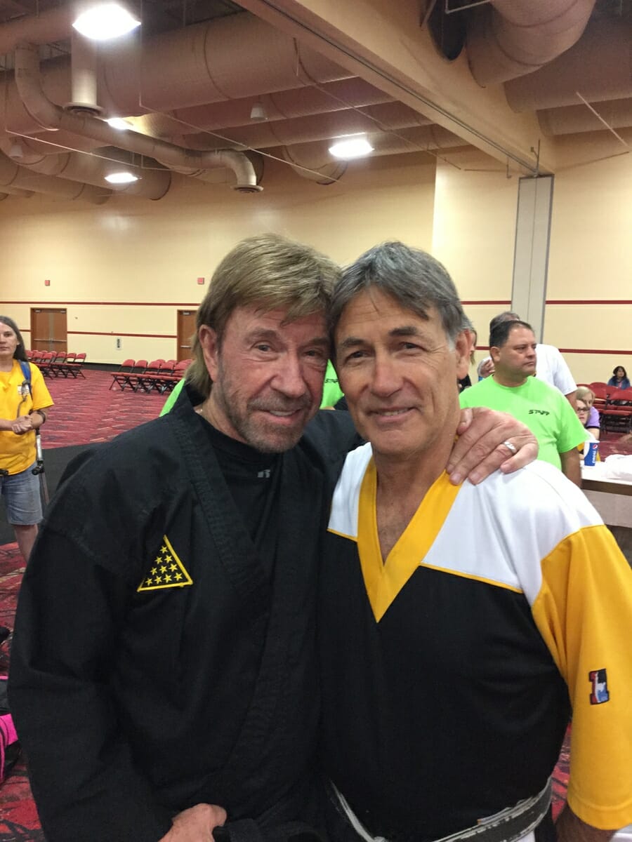 Chuck Elias, head instructor at Club Karate, is shown here with actor Chuck Norris. Photo provided.