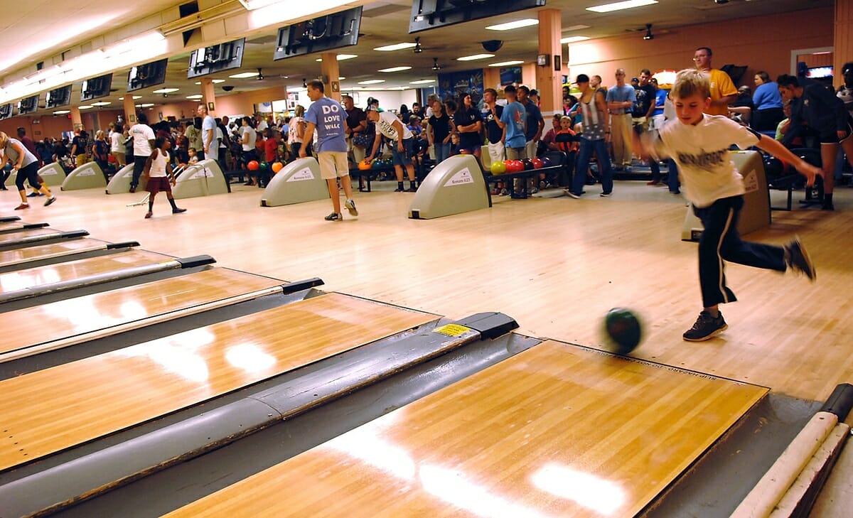 Bryce Young, 8, looks like a pro bowler as he releases his ball during the inaugural Racial Harmony Bowling Event on Aug. 23. The event, according to Pastor Randy Roberts of Love House Ministries, was a direct result of racist graffiti spray painted on an exterior wall of their bowling alley on Aug. 19.
