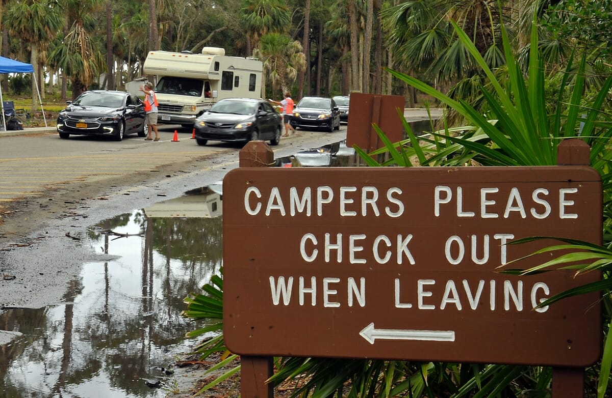 The Hunting Island State Park Campground officially opened on Aug. 4. Here, campers check in with volunteers Jim and Pam Holcombe for directions and check-in information. The popular campground has been closed since October 2016 because of Hurricane Matthew.