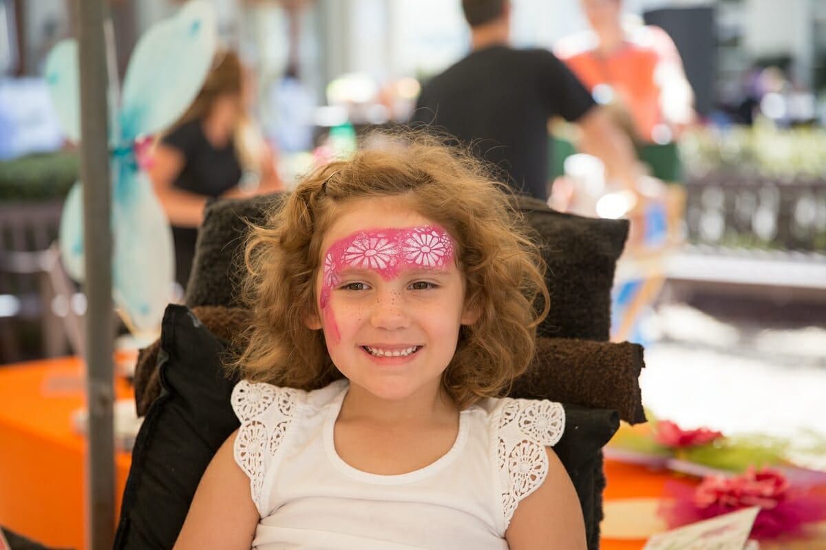 A little girl gets her face painted at the 9th Annual Habersham Harvest Festival. Photo by SK Signs & Designs.
