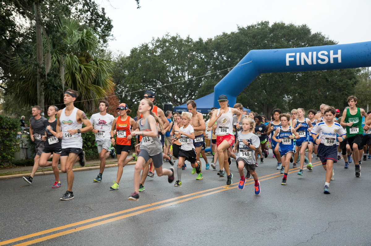 Runners and walkers take off at the start of the Run Forrest Run 5K.